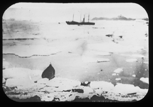 Image of Vessel in distance; small boat on ice